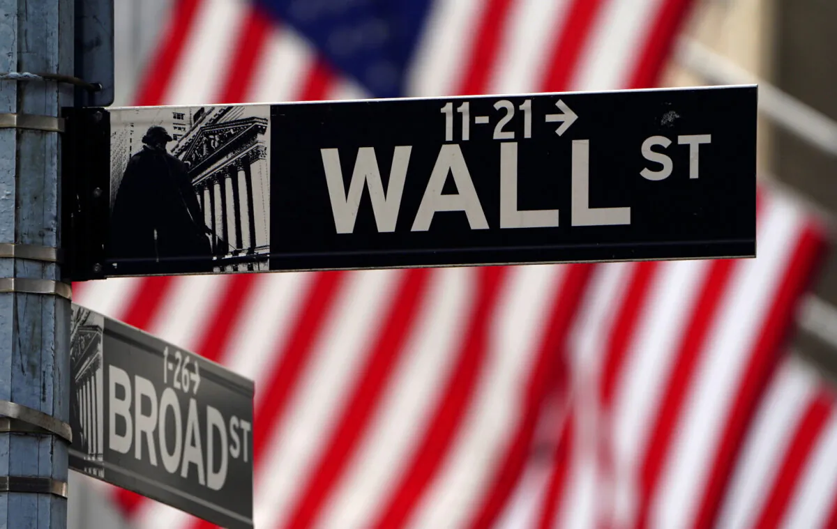 A Wall Street sign is pictured outside the New York Stock Exchange amid the COVID-19 pandemic in the Manhattan borough of New York City, on April 16, 2021. (Carlo Allegri/Reuters)
