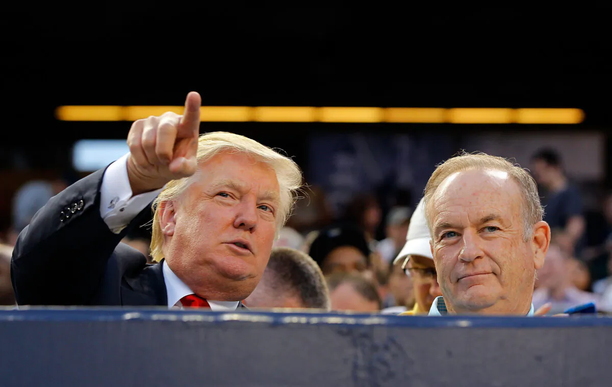 Donald Trump (L) and television personality Bill O'Reilly attend the game between the New York Yankees and the Baltimore Orioles at Yankee Stadium in the Bronx borough of New York City on July 30, 2012. (Jim McIsaac/Getty Images)