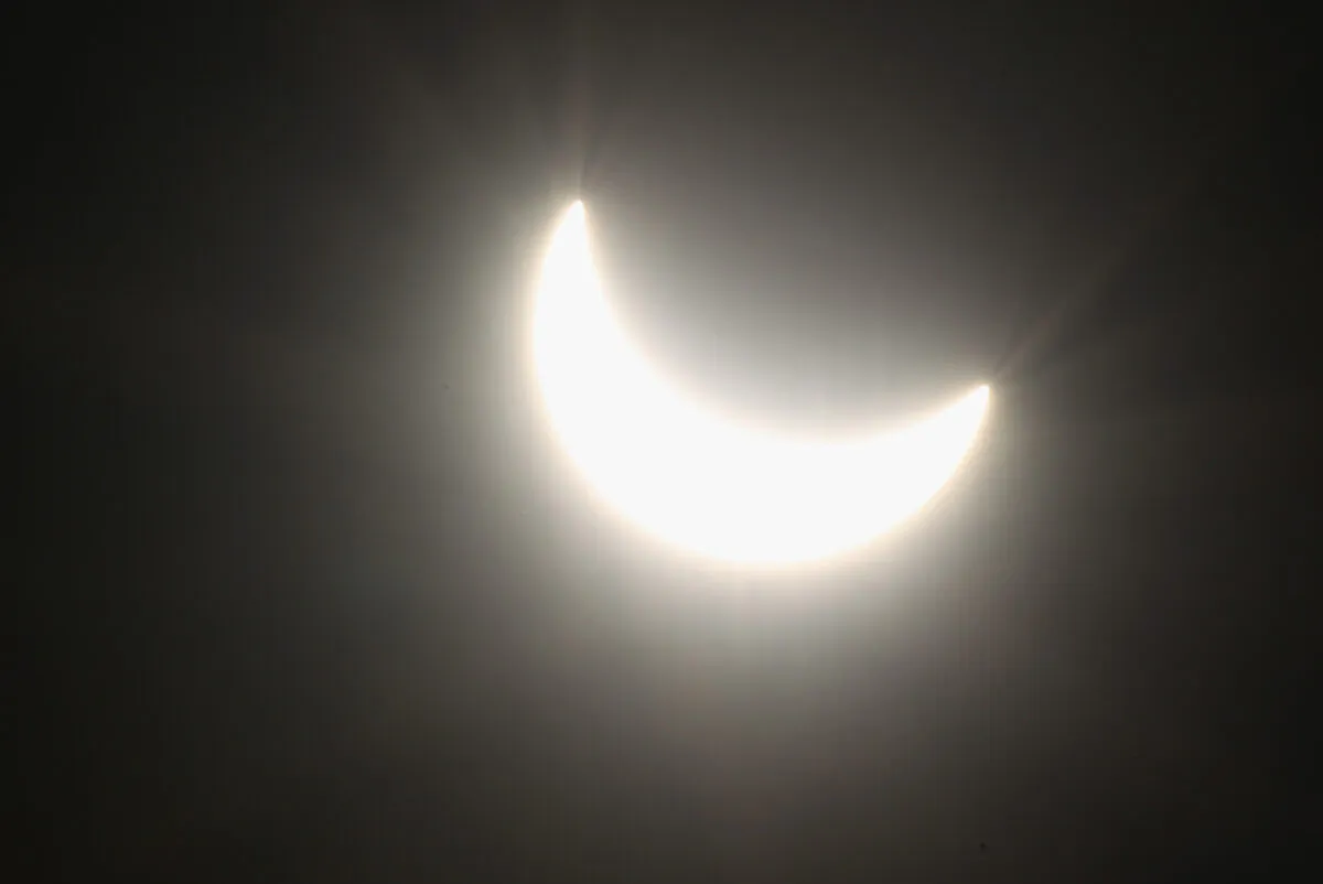 The moon covers a portion of the sun at 10:41 a.m. during a partial solar eclipse in Berlin on March 20, 2015. (Sean Gallup/Getty Images)