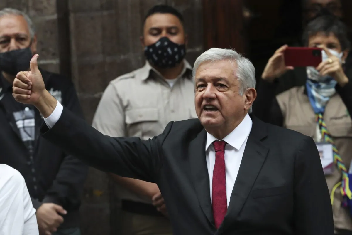 Mexico's President Andres Manuel Lopez Obrador thumbs up after voting in congressional, state and local elections in Mexico City, on June 6, 2021. (Marco Ugarte/AP Photo)