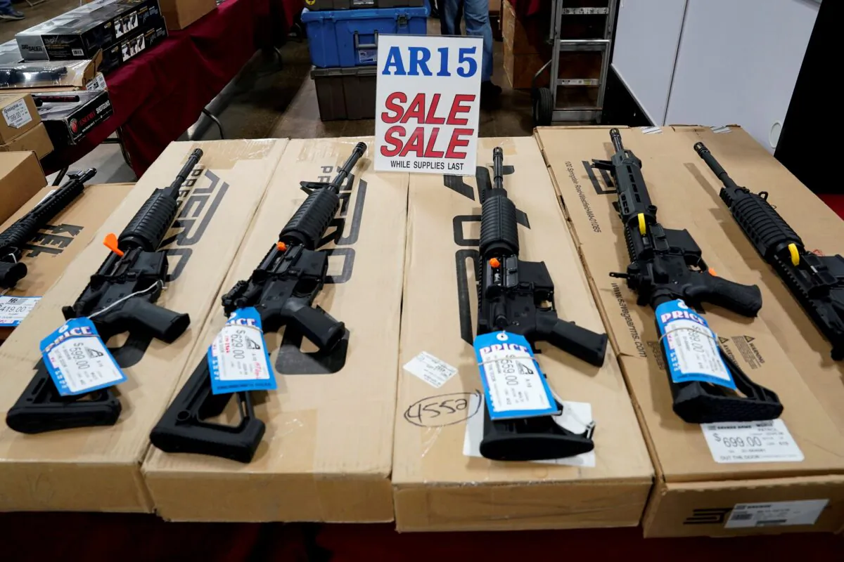 AR-15 rifles are displayed for sale at the Guntoberfest gun show in Oaks, Pa., on Oct. 6, 2017. (Joshua Roberts/Reuters)