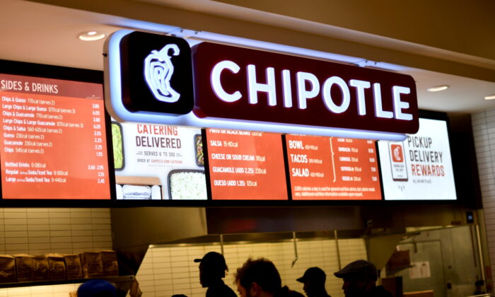 Customers order from a Chipotle restaurant as pre-Thanksgiving and Christmas holiday shopping accelerates at the King of Prussia Mall in King of Prussia, Pa., on Nov. 22, 2019. (Mark Makela/Reuters)