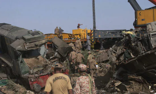 Official: Death Toll Rises to 65 in Pakistan Train Collision