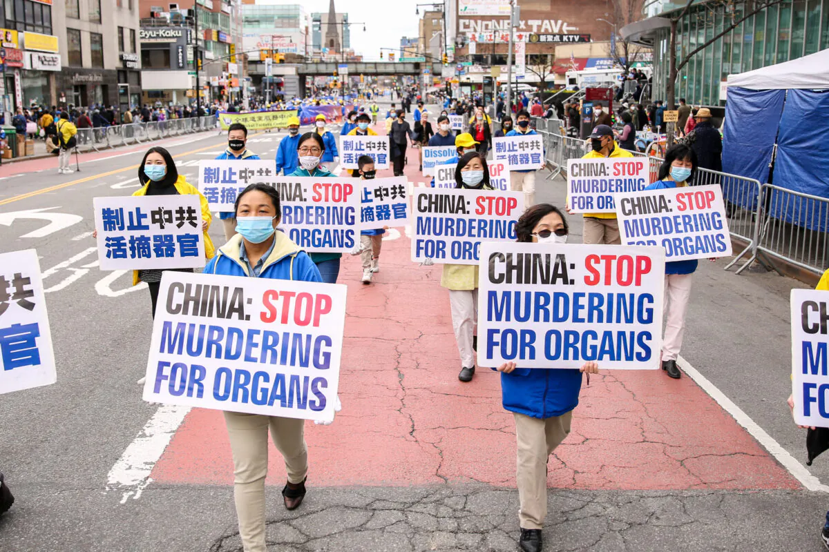 Falun Gong practitioners take part in a parade in New York on April 18, 2021, to commemorate the 22nd anniversary of the April 25 peaceful appeal of 10,000 Falun Gong practitioners in Beijing. (Samira Bouaou/The Epoch Times)