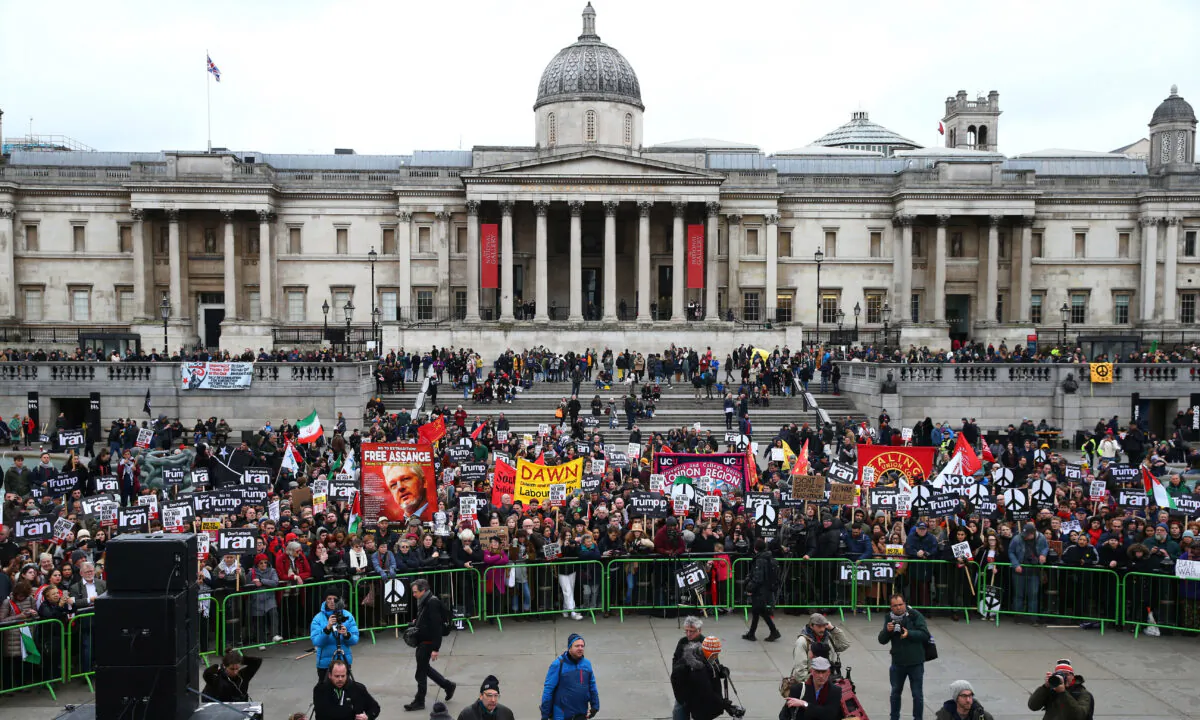 Three days after a Ukrainian airliner was shot down in Tehran, protesters attend a rally against the threat of war against Iran in Trafalgar Square, London, on Jan. 11, 2020.  (Hollie Adams/Getty Images)