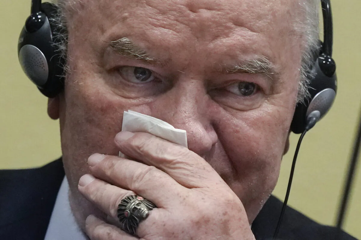 Former Bosnian Serb military chief Ratko Mladic sits in the court room in The Hague, Netherlands, where the UN court delivers its verdict in the appeal of Mladic against his convictions for genocide and other crimes and his life sentence for masterminding atrocities throughout the Bosnian war, June 8, 2021. (Peter Dejong/AP Photo)