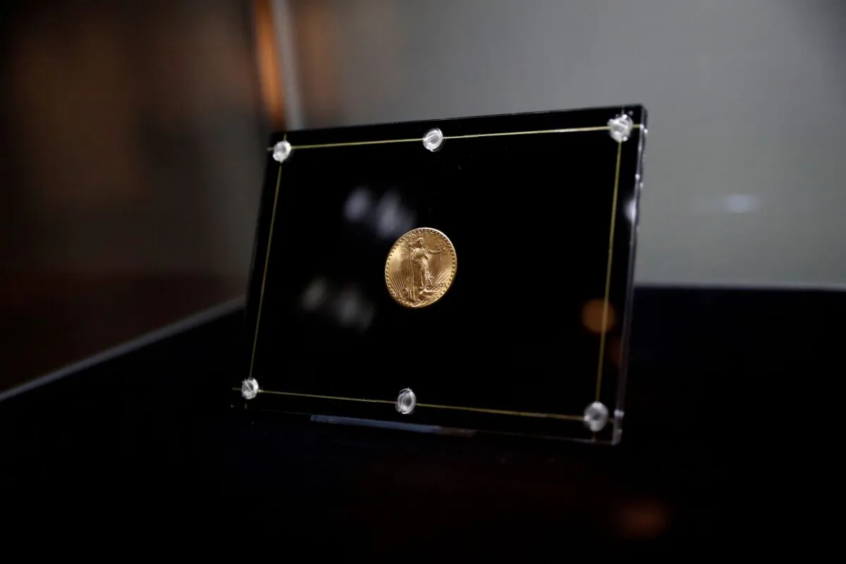 The 1933 Double Eagle coin is seen encased during a media preview before the auction at Sotheby's in New York City, on June 4, 2021. (Shannon Stapleton/Reuters)