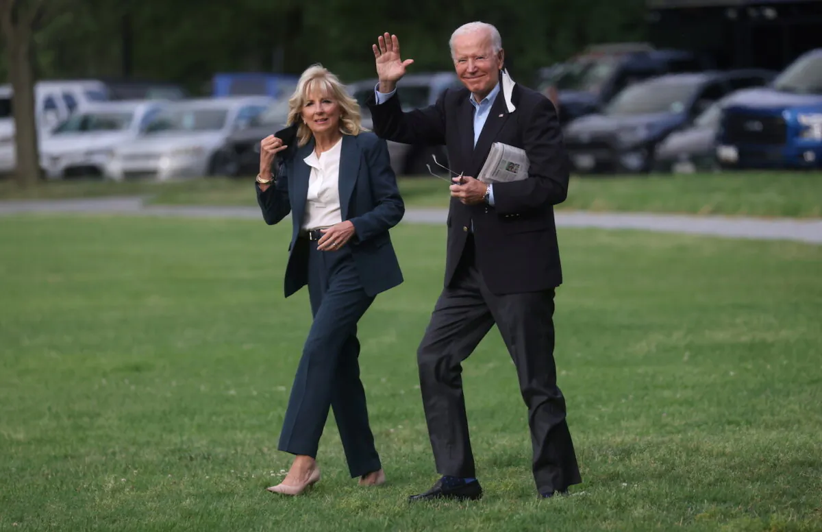 President Joe Biden and First Lady Jill Biden walk to board Marine One for travel to the G-7 Summit in the UK from the Ellipse at the White House in Washington on June 9, 2021. (Leah Millis/Reuter)