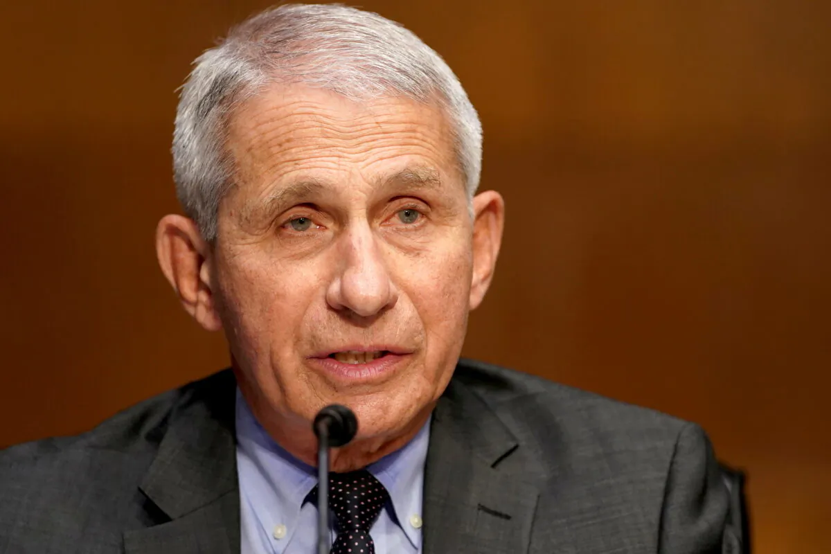 Dr. Anthony Fauci, director of the National Institute of Allergy and Infectious Diseases, gives an opening statement during a Senate Health, Education, Labor, and Pensions Committee hearing to discuss the on-going federal response to COVID-19, at the U.S. Capitol on May 11, 2021. (Greg Nash/Pool via Reuters)
