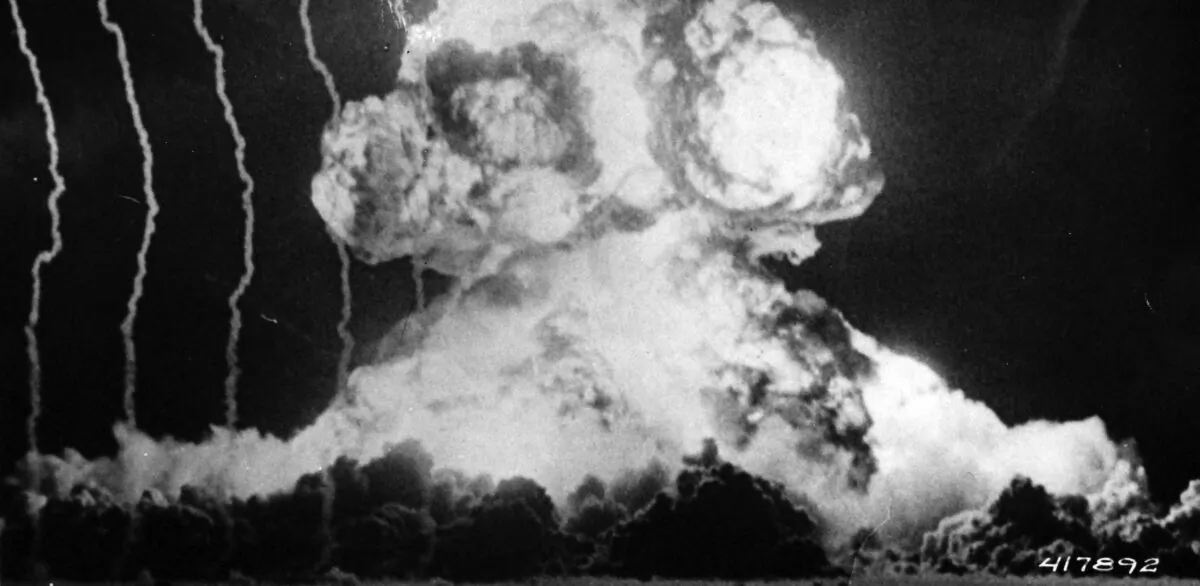 A Signal Corps camera records the burst of an atomic bomb during an atomic bomb test at Yucca Flat, Nev., on March 17, 1953. (National Museum of the U.S. Navy via Wikimedia Commons)