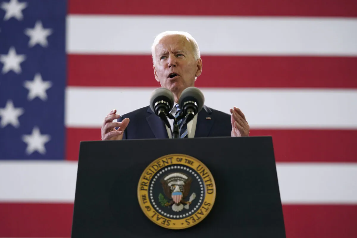 President Joe Biden speaks to American service members at RAF Mildenhall in Suffolk, England, on June 9, 2021. (Patrick Semansky/AP Photo)