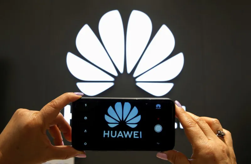 A Huawei logo is seen on a cell phone screen in their store at Vina del Mar, Chile, on July 18, 2019. (Rodrigo Garrido/Reuters)