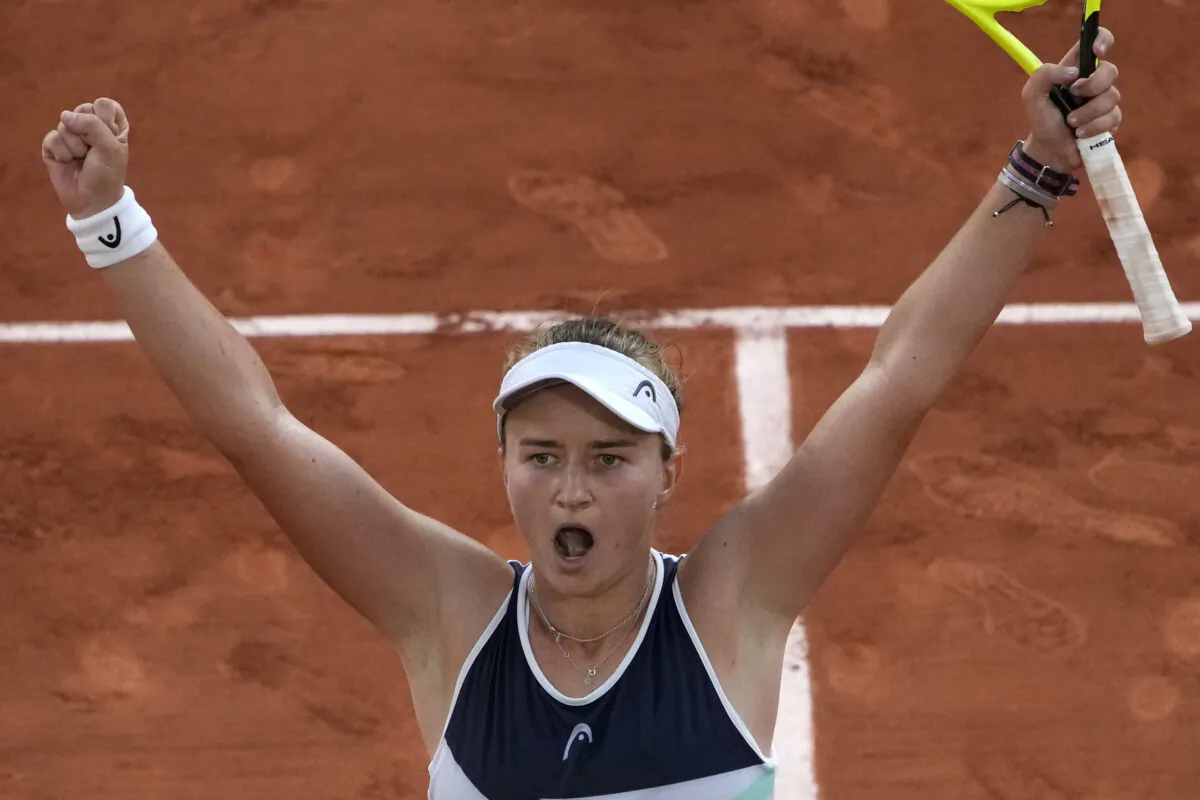 Czech Republic's Barbora Krejcikova celebrates as she defeats Maria Sakkari of Greece in their semifinal match of the French Open tennis tournament at the Roland Garros stadium in Paris, France, on June 10, 2021. (Christophe Ena/AP Photo)