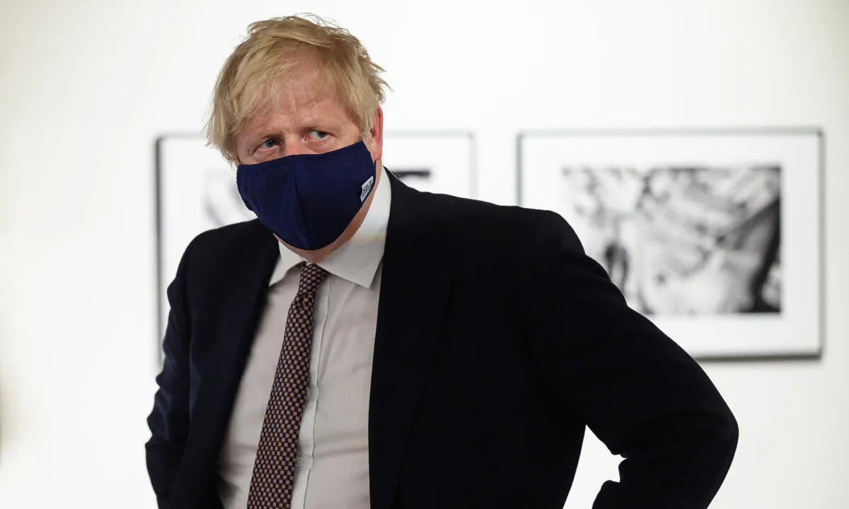 Prime Minister Boris Johnson during a visit to Falmouth's Maritime Museum in Falmouth, Cornwall, England on June 10, 2021. (Leon Neal/PA)
