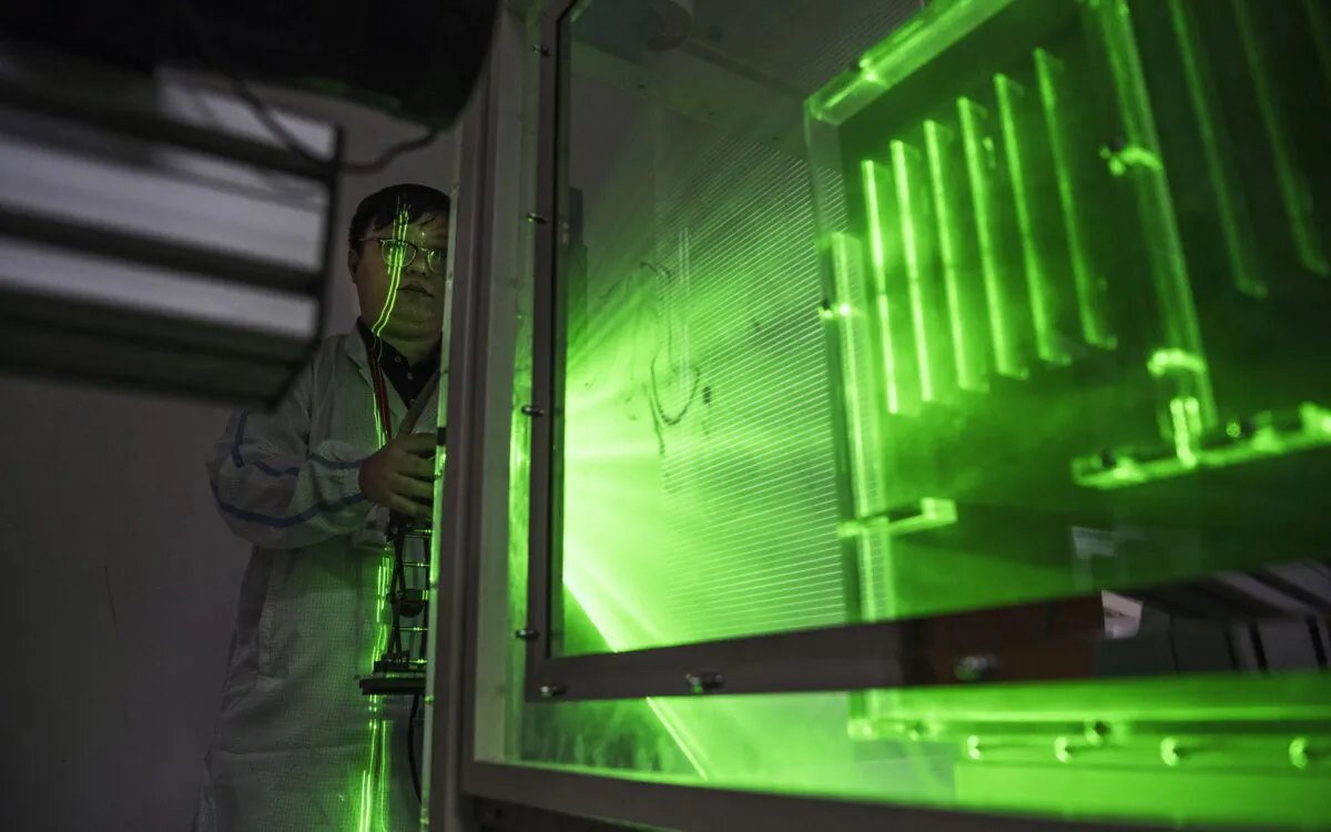 A Huawei thermal engineer performs a heat test in the research and development area of the Bantian campus in Shenzhen, China, on April 12, 2019. (Kevin Frayer/Getty Images)