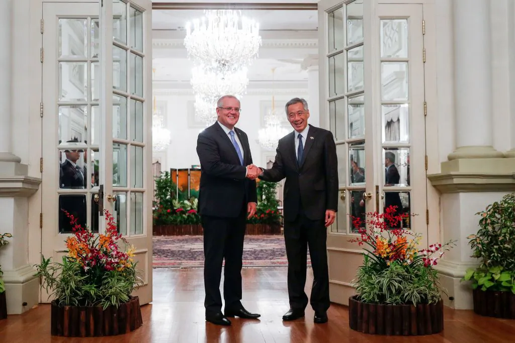 Australia's Prime Minister Scott Morrison (L) and Singapore Prime Minister Lee Hsien Loong shake hands at the Istana Presidential Palace in Singapore on June 7, 2019. (Wallace Woon/AFP via Getty Images)