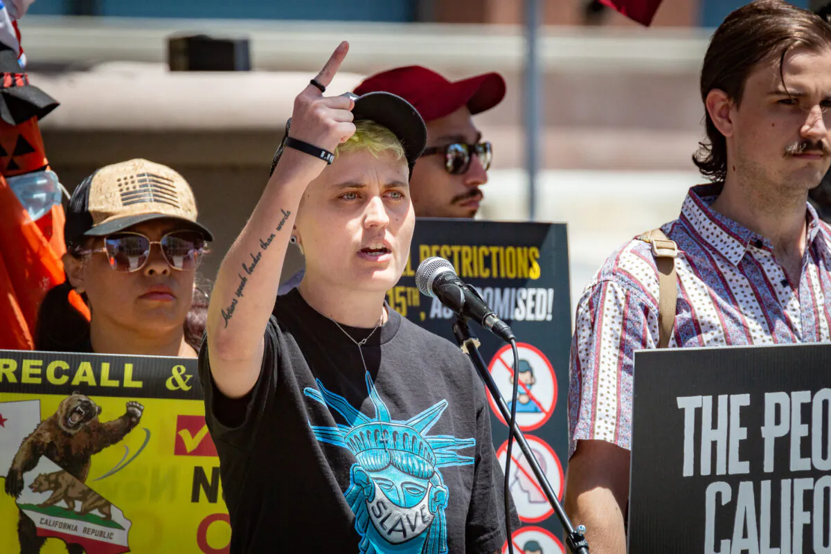 Demonstrators gather to protest coronavirus restrictions by Cal-OSHA in Santa Ana, Calif., on June 10, 2021. (John Fredricks/The Epoch Times)