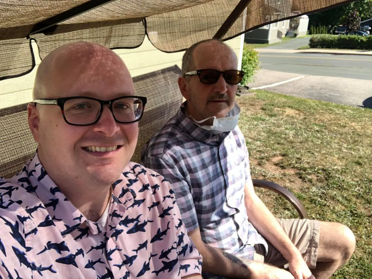 Steve Ellis (L) with his father, Roger Ellis, who suffers from a mysterious neurological syndrome that has appeared in clusters in New Brunswick, in Bathurst, N.B., in August 2020. (Courtesy of Steve Ellis)