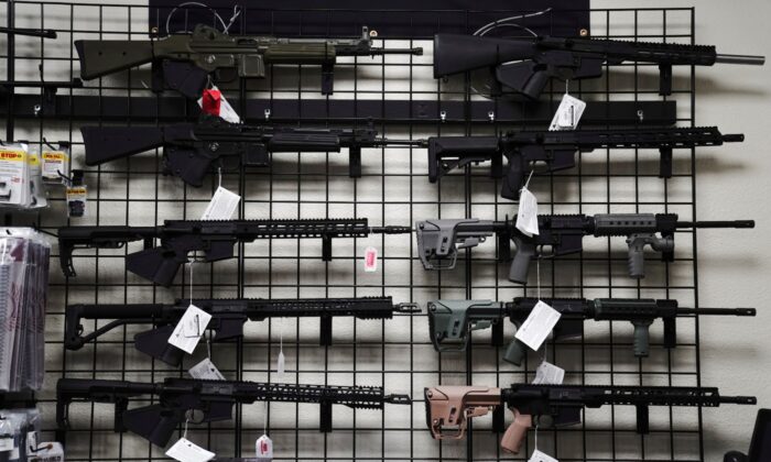 AR-15 style rifles are displayed for sale at Firearms Unknown, a gun store in Oceanside, Calif., on April 12, 2021. (Bing Guan/Reuters)