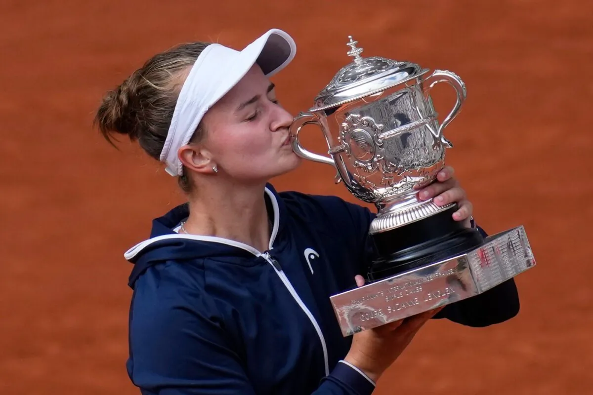 Czech Republic's Barbora Krejcikova kisses the cup after defeating Russia's Anastasia Pavlyuchenkova in their final match of the French Open tennis tournament at the Roland Garros stadium in Paris, France, on June 12, 2021. (Christophe Ena/AP Photo)