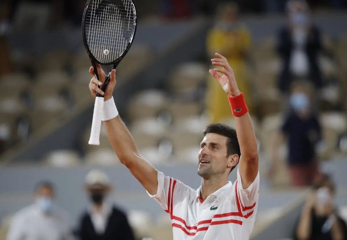 Serbia's Novak Djokovic celebrates winning his semifinal match against Spain's Rafael Nadal at the French Open tennis tournament at the Roland Garros stadium in Paris on June 11, 2021. (Sarah Meyssonnier/Reuters)