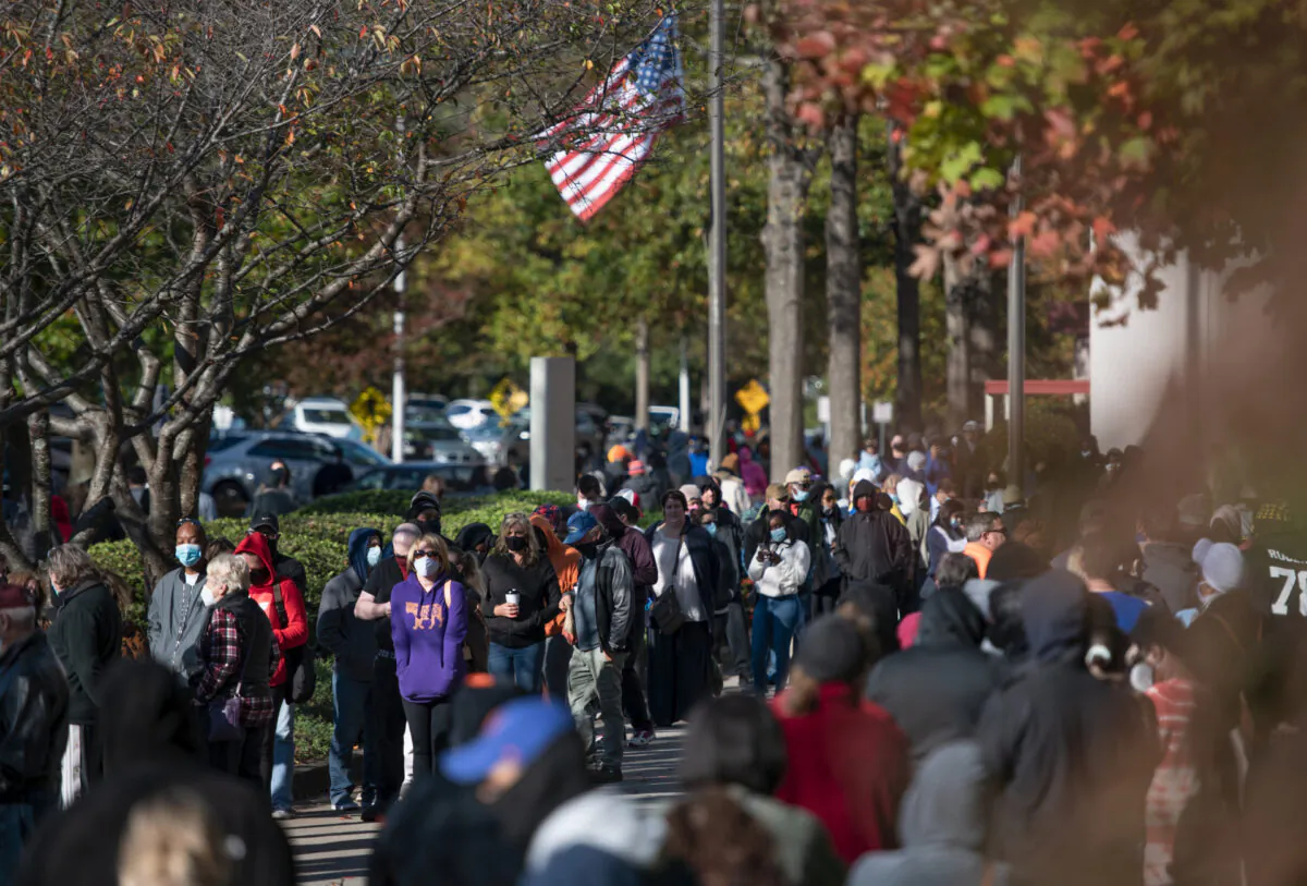 People wait in line to participate in early voting in Greenville, South Carolina, on Oct, 31, 2020. (Sean Rayford/Getty Images)