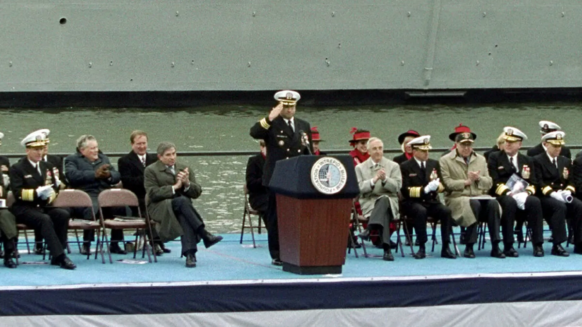 U.S. Navy Commander Carlos Del Toro salutes the audience at the commissioning of the battleship USS Bulkeley in New York City on Dec. 8, 2001. (Getty Images)