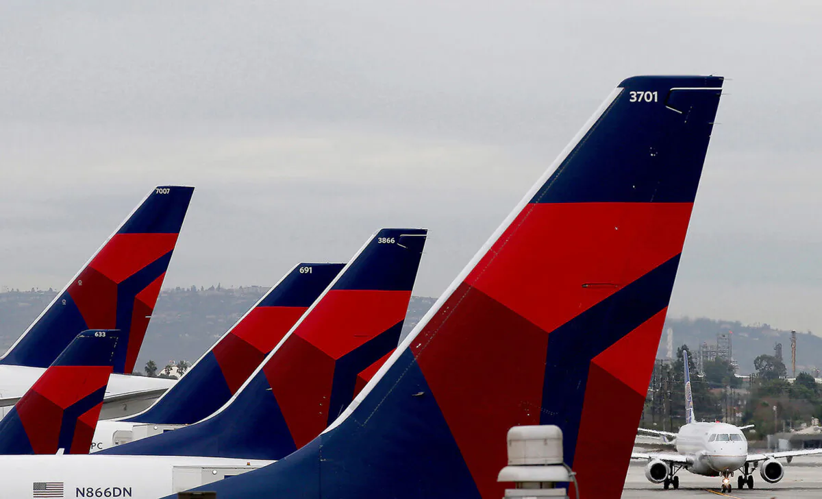 Delta Airlines aircraft are lined up at Terminal 5 in Los Angeles International Airport on Dec. 21, 2016. (Luis Sinco/Los Angeles Times/TNS)