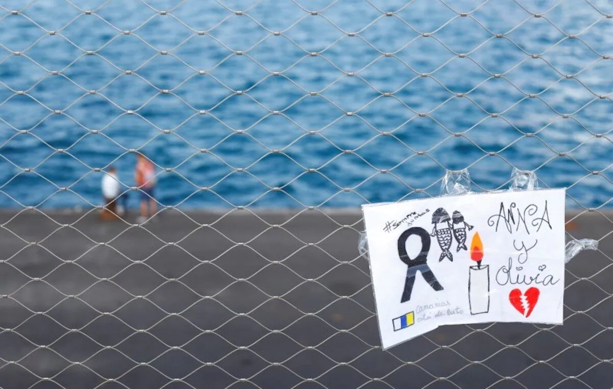 A sign placed on a fence in memory of the missing girls in the Canary Islands is seen in Santa Cruz de Tenerife, Spain, on June 11, 2021. (Borja Suarez/File/Reuters)
