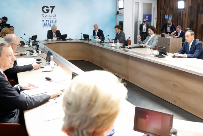 Italy's Prime Minister Mario Draghi, German Chancellor Angela Merkel, Britain's Prime Minister Boris Johnson, U.S. President Joe Biden, France's President Emmanuel Macron, Canada's Prime Minister Justin Trudeau, and Japan's Prime Minister Yoshihide Suga attend a plenary session during G-7 summit in Carbis Bay, Cornwall, United Kingdom, on June 13, 2021. (Phil Noble/Pool/Reuters)