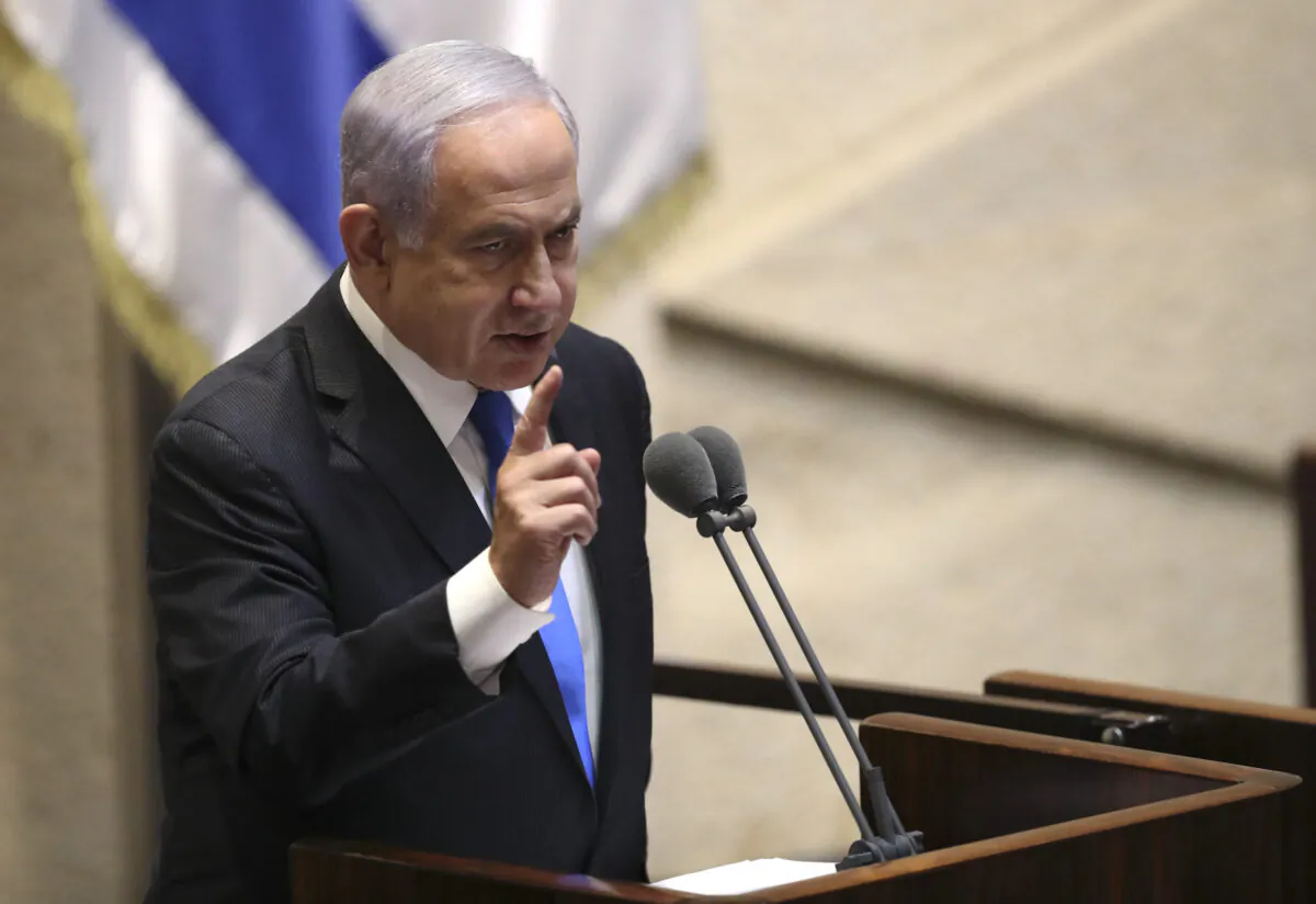 Israel's outgoing prime minister Benjamin Netanyahu speaks during a Knesset session in Jerusalem on June 13, 2021. (Ariel Schali/AP Photo)