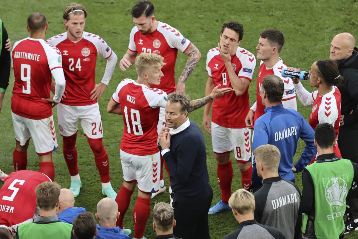 Denmark's manager Kasper Hjulmand instructs his players during the half time of the Euro 2020 soccer championship group B match between Denmark and Finland at Parken stadium in Copenhagen, Denmark, on June 12, 2021. (Wolfgang Rattay/Pool via AP)