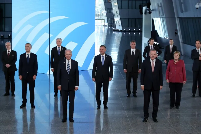 NATO Heads of the states and governments pose for a family photo during the NATO summit at the Alliance's headquarters, in Brussels on June 14. (Yves Herman/Pool/Reuters)