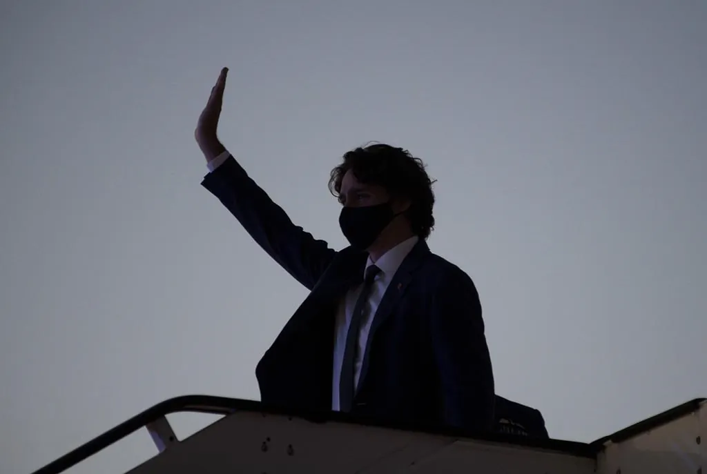 Canadian Prime Minister Justin Trudeau waves as he arrives in Brussels, Belgium, on June 13, 2021. (The Canadian Press/Adrian Wyld)