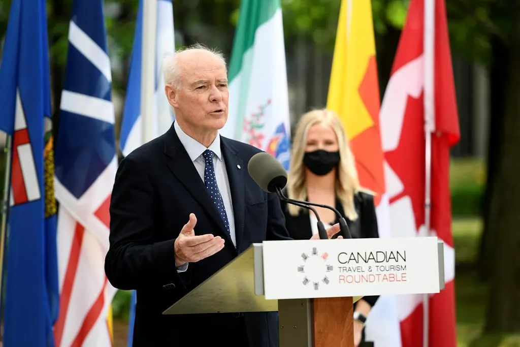 Perrin Beatty, president and CEO of the Canadian Chamber of Commerce and former defence minister, speaks during a news conference held by the Canadian Travel and Tourism Roundtable at the Ottawa Airport in Ottawa, on June 14, 2021. (Justin Tang/The Canadian Press)