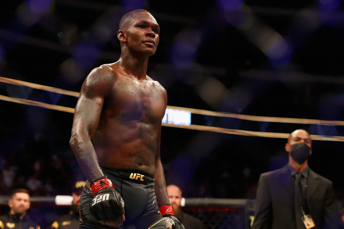 Israel Adesanya of Nigeria reacts after defeating Marvin Vettori of Italy by unanimous decision to win the middleweight championship during UFC 263 at Gila River Arena in Glendale, Ariz., on June 12, 2021. (Christian Petersen/Getty Images)