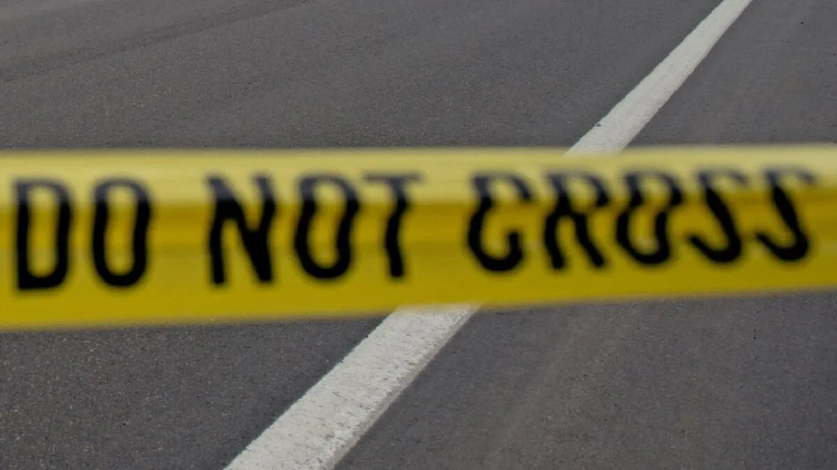 Police tape in a file photo. (Jason Connolly/AFP via Getty Images)
