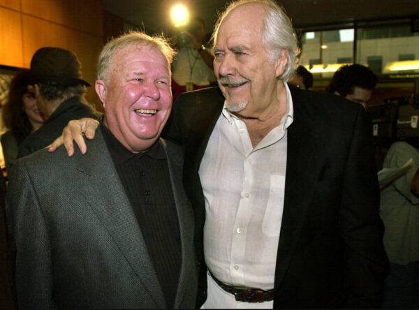 Director-producer Robert Altman, right, laughs with actor Ned Beatty