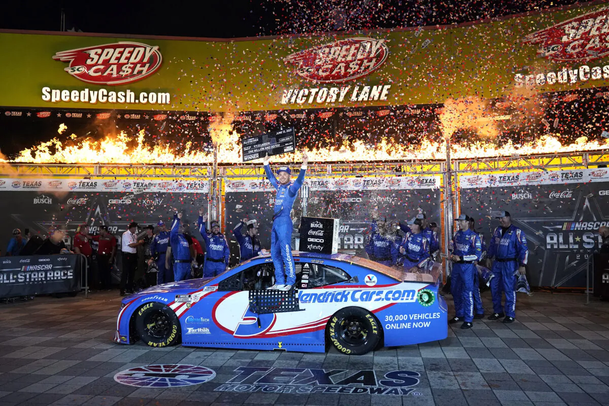 Kyle Larson celebrates in Victory Lane after winning the NASCAR Cup Series All-Star auto race at Texas Motor Speedway in Fort Worth, Texas, on June 13, 2021. (Tony Gutierrez/AP Photo)