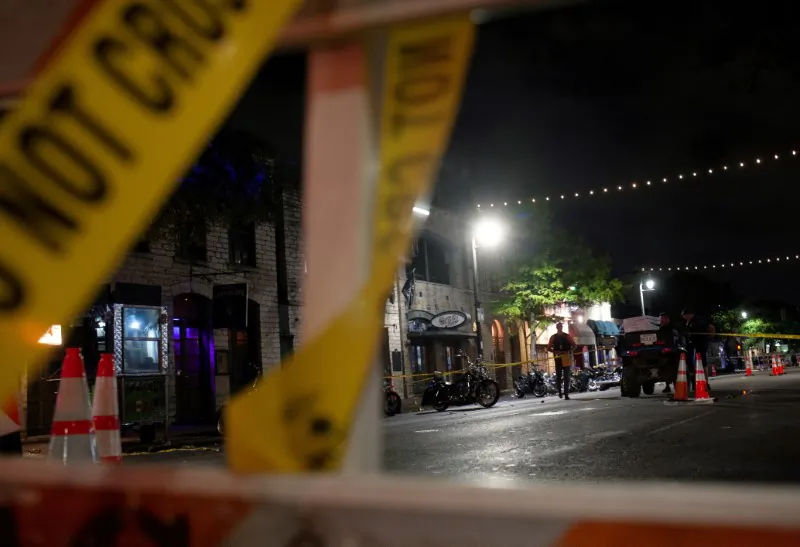 Police investigate the scene in Austin, Texas, on June 12, 2021. (Nuri Vallbona/Reuters)
