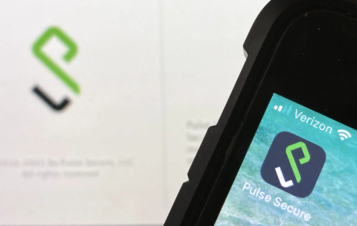 An Icon for the Pulse Secure smartphone app (R) and a computer desktop info page are seen in Burke, Va., on June 14, 2021. (AP Photo)