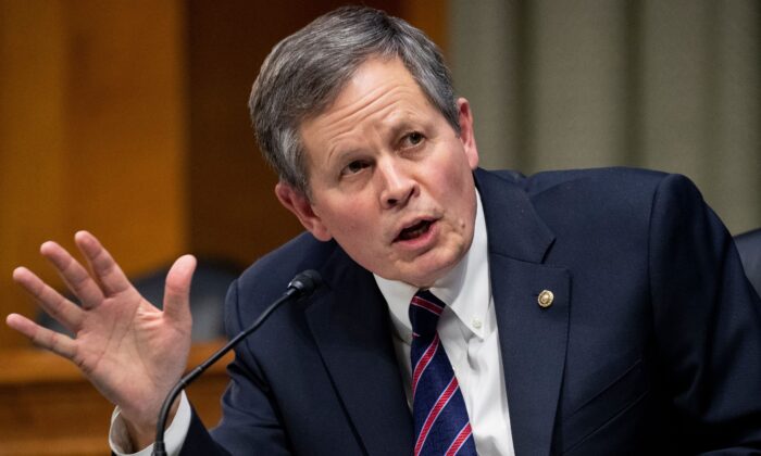 Republican Sen. Steve Daines (Mont.) directs a question regarding limiting abortions to Xavier Becerra during the Senate Finance Committee hearing on Becerra's nomination to be secretary of Health and Human Services (HHS), on Capitol Hill in Washington on Feb. 24, 2021. (Michael Reynolds/POOL/AFP via Getty Images)