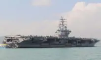 US Navy Says Carrier Group Operating in South China Sea