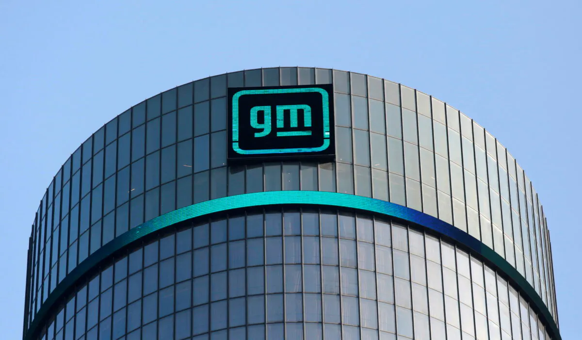 The new GM logo is seen on the facade of the General Motors headquarters in Detroit, Mich., on March 16, 2021. (Rebecca Cook/Reuters)