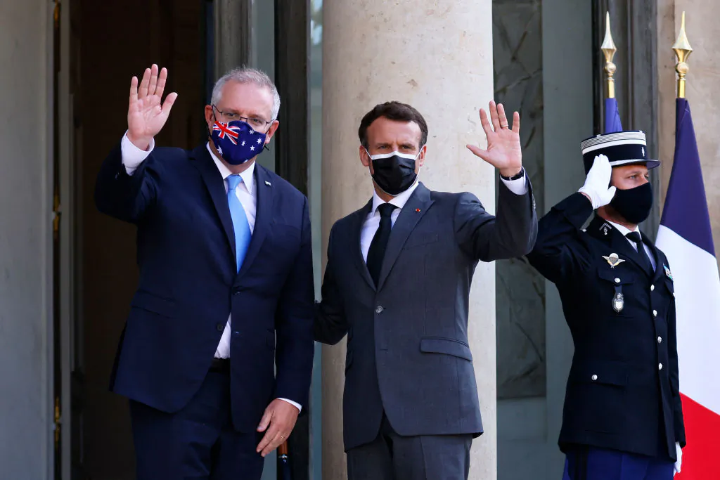 French President Emmanuel Macron poses with Australia's Prime Minister Scott Morrison at the Elysee Palace in Paris, France, on June 15, 2021. (Thomas Samson/AFP via Getty Images)
