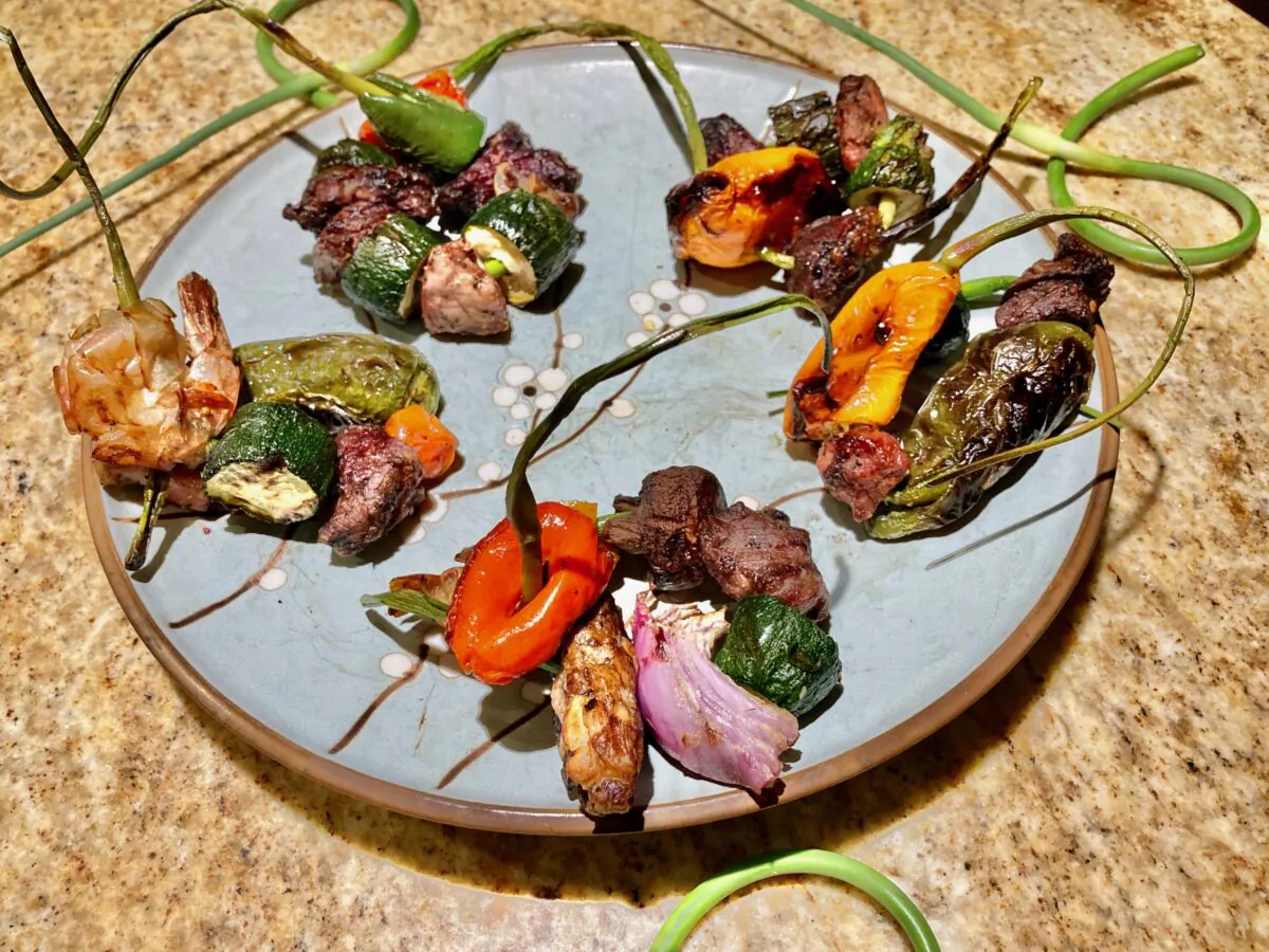 Turn garlic scapes into edible kebab skewers for grilled meat and veggies. (Ari LeVaux)