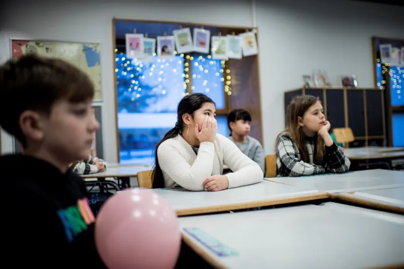 Pupils attend a class as schools reopen after lockdown due to the COVID-19 outbreak at Tved School in Svendborg, on the island of Funen, Denmark, on Feb. 8, 2021.  (Ritzau Scanpix/Tim Kildeborg Jensen via Reuters)