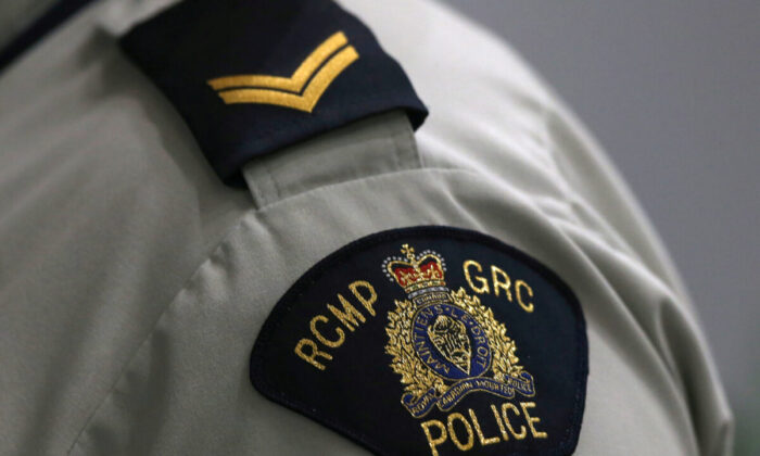 A Royal Canadian Mounted Police (RCMP) crest is seen on a member's uniform in a file photo. (Shannon VanRaes/File Photo via Reuters)