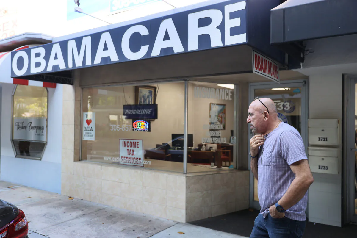 A. Michael Khoury stands outside of his Leading Insurance Agency, which offers plans under the Affordable Care Act (also known as Obamacare) in Miami, Fla., on Jan. 28, 2021. (Joe Raedle/Getty Images)