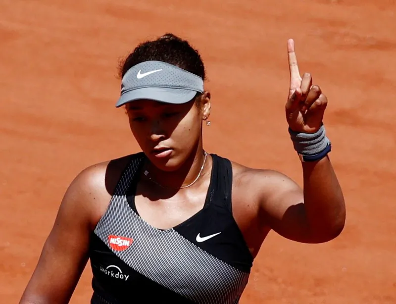 Japan's Naomi Osaka reacts during her first round match against Romania's Patricia Maria Tig in Roland Garros, Paris, France, on May 30, 2021. (Christian Hartmann/Reuters)